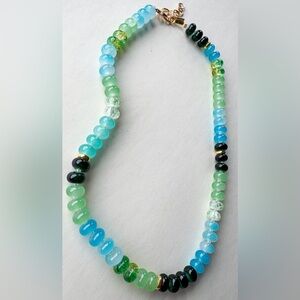 Green toned glass beaded necklace.
Custom order if interested $25.00